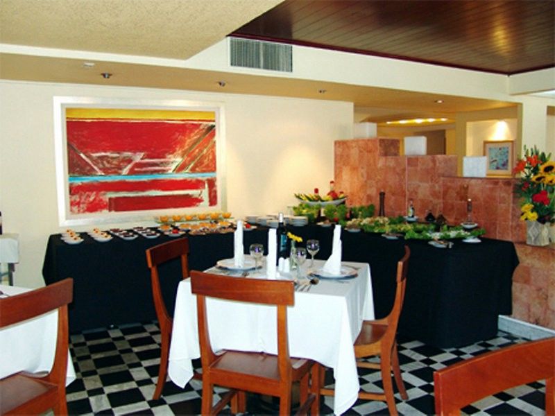 Exe Suites San Marino Cidade do México Restaurante foto